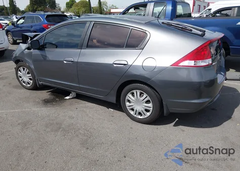 2011 Honda Insight z USA, uszkodzony, nr VIN JHMZE2H38BS008257